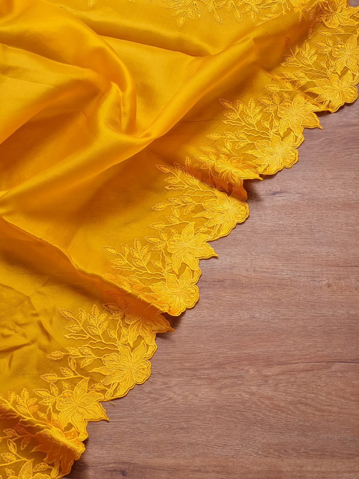 Yellow color Pure organza silk Cut work saree