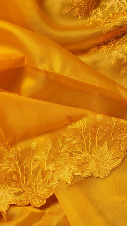 Yellow color Pure organza silk Cut work saree