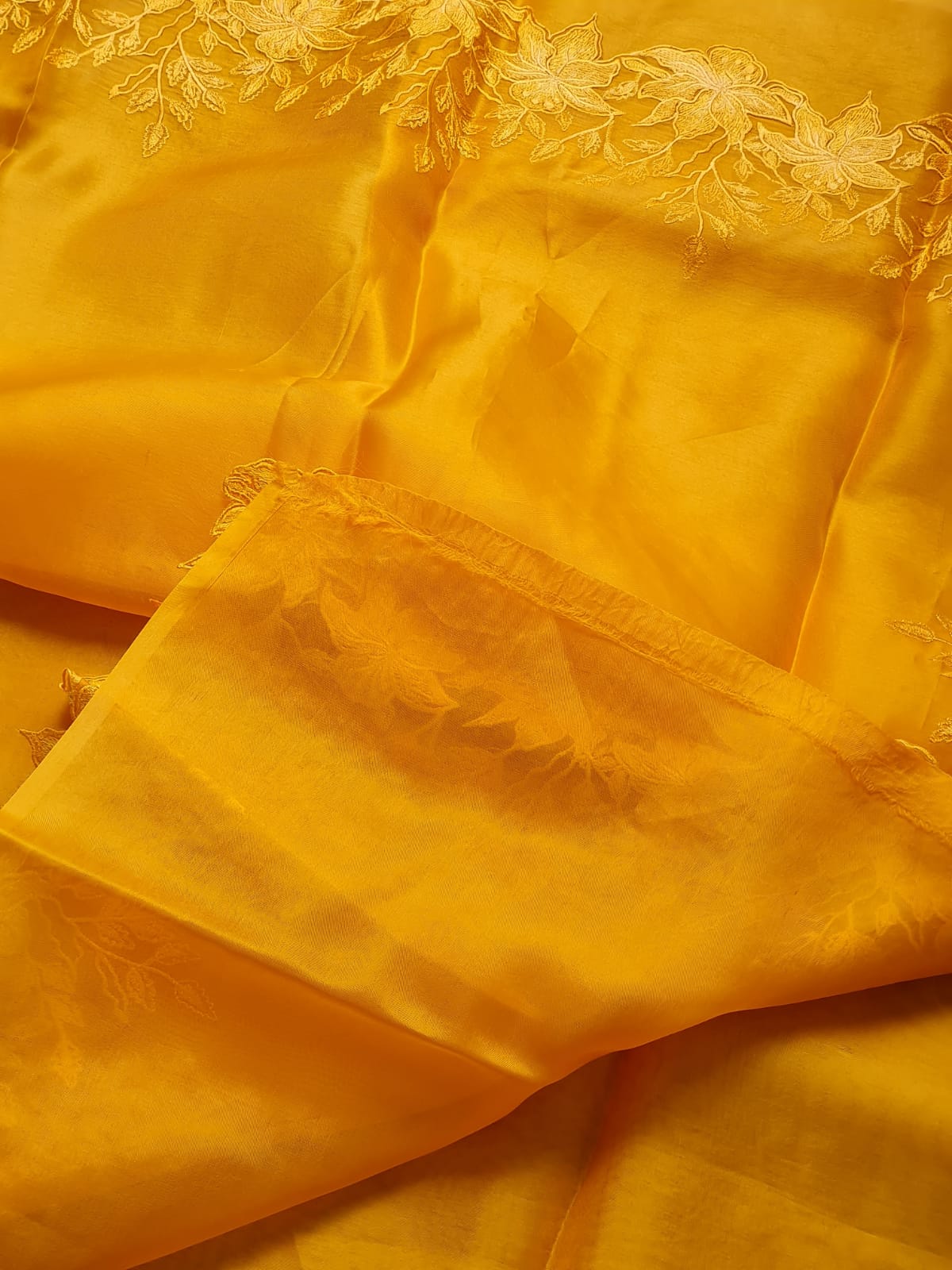 Yellow color Pure organza silk Cut work saree