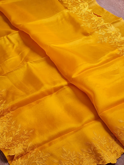 Yellow color Pure organza silk Cut work saree